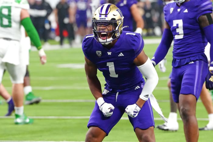 Dec 1, 2023; Las Vegas, NV, USA; Washington Huskies cornerback Jabbar Muhammad (1) celebrates after making a play against the Oregon Ducks during the second quarter at Allegiant Stadium. Mandatory Credit: Stephen R. Sylvanie-USA TODAY Sports